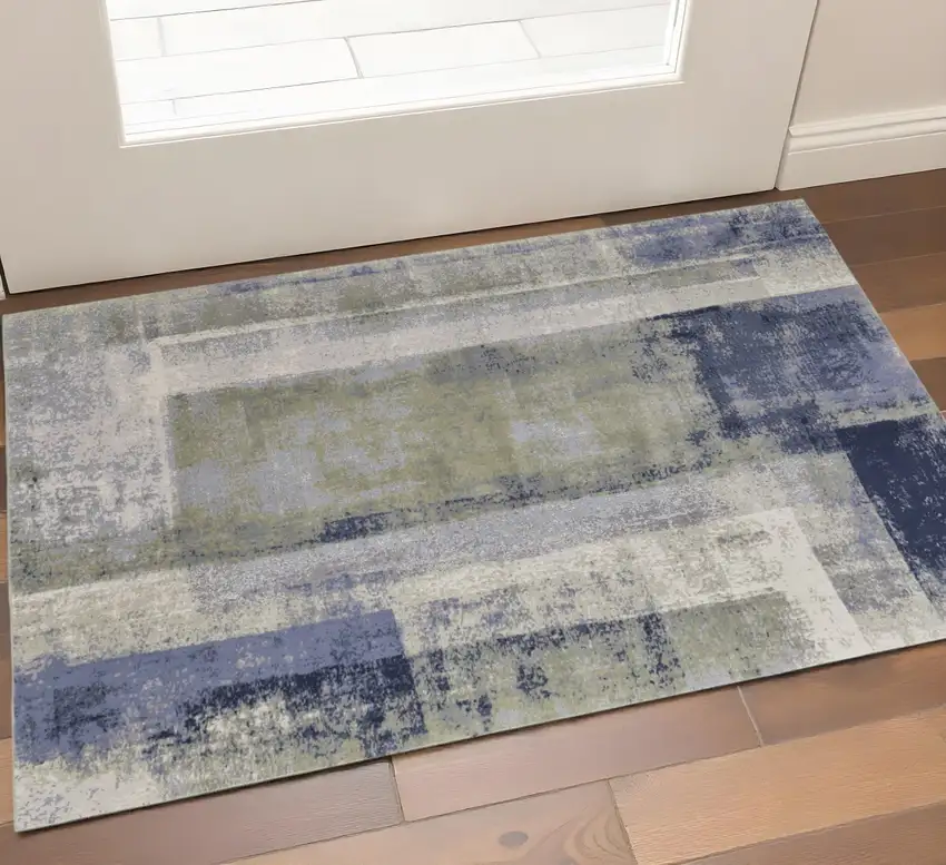 Blue Green And Ivory Abstract Distressed Area Rug Photo 1