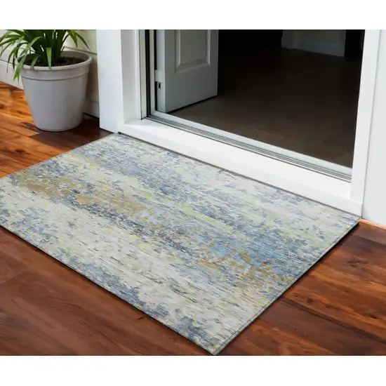 Blue Green And Ivory Abstract Washable Indoor Outdoor Area Rug Photo 1