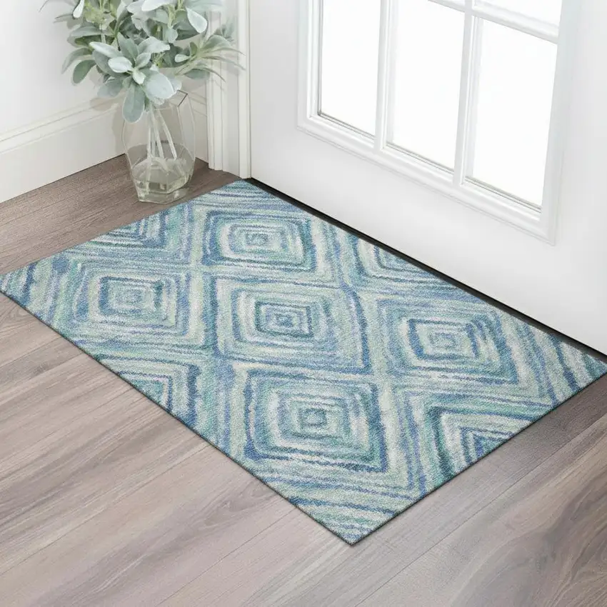 Blue Green And Ivory Geometric Washable Area Rug With UV Protection Photo 1