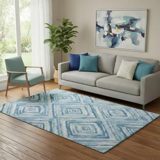 Blue Green And Ivory Geometric Washable Area Rug With UV Protection Photo 1