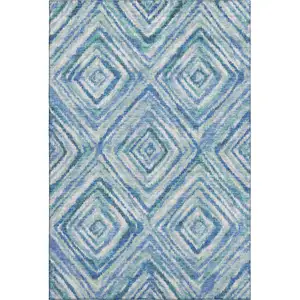 Photo of Blue Green And Ivory Geometric Washable Area Rug With UV Protection