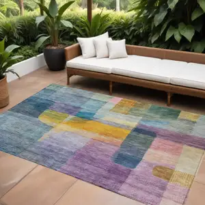 Photo of Blue Green And Purple Abstract Washable Indoor Outdoor Area Rug