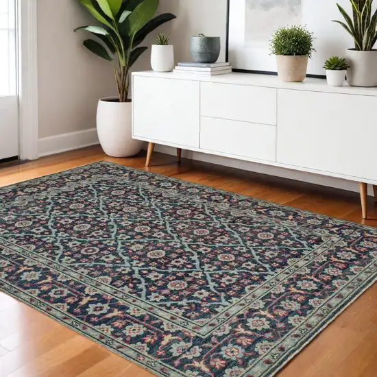 Blue and Green Wool Floral Hand Knotted Distressed Area Rug With Fringe Photo 1