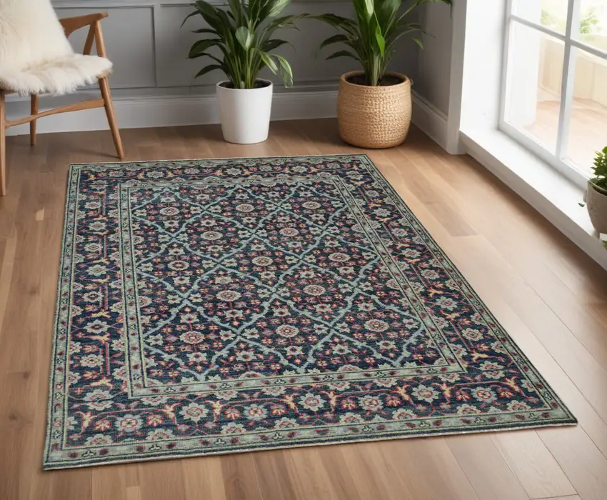 Blue and Green Wool Floral Hand Knotted Distressed Area Rug With Fringe Photo 1