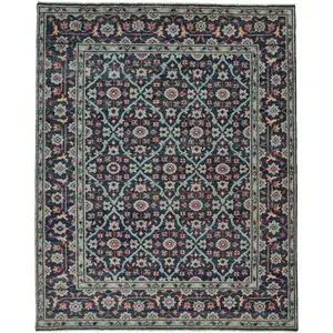 Photo of Blue Green And Red Wool Floral Hand Knotted Distressed Stain Resistant Area Rug With Fringe