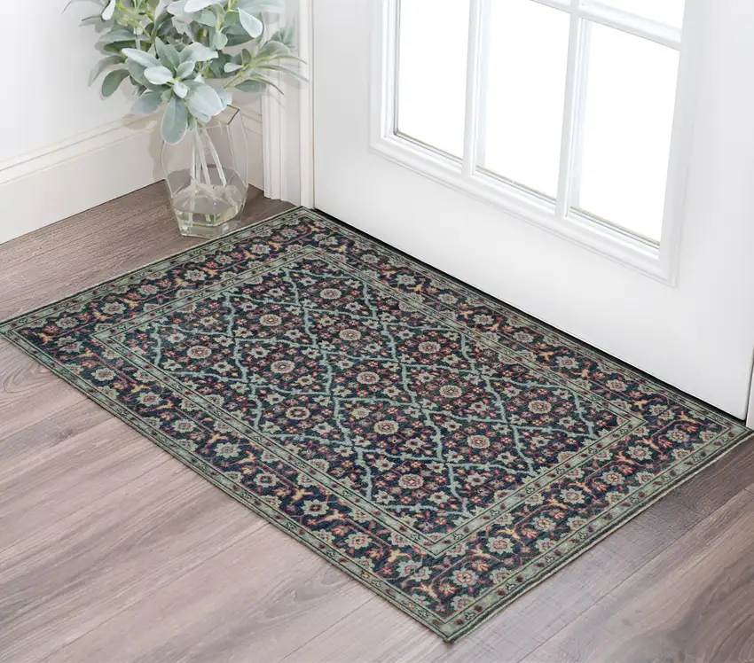 Blue and Green Wool Floral Hand Knotted Distressed Area Rug With Fringe Photo 1