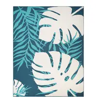 Photo of Blue Green Cream Geometric Stain Resistant Indoor Outdoor Area Rug