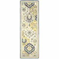 Photo of Blue Green Gold Navy And Ivory Geometric Tufted Handmade Stain Resistant Runner Rug