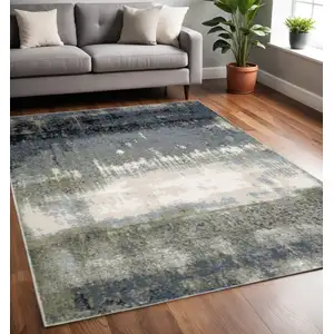 Photo of Blue Green Grey And Beige Abstract Power Loom Stain Resistant Area Rug