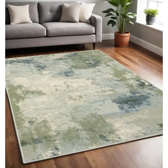 Blue Green Grey And Ivory Abstract Power Loom Stain Resistant Area Rug Photo 1