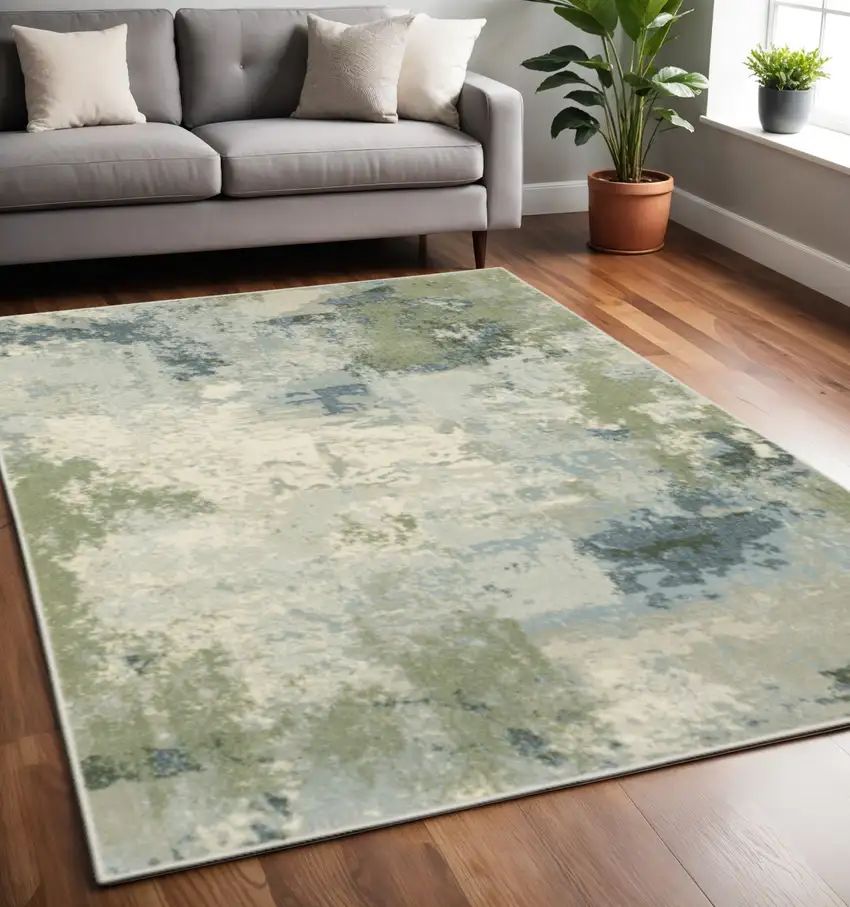 Blue Green Grey And Ivory Abstract Power Loom Stain Resistant Area Rug Photo 1