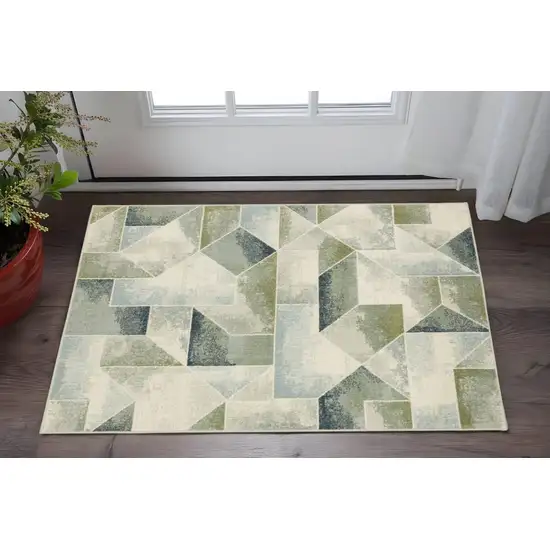 Blue Green Grey Gold And Ivory Geometric Power Loom Stain Resistant Area Rug Photo 1