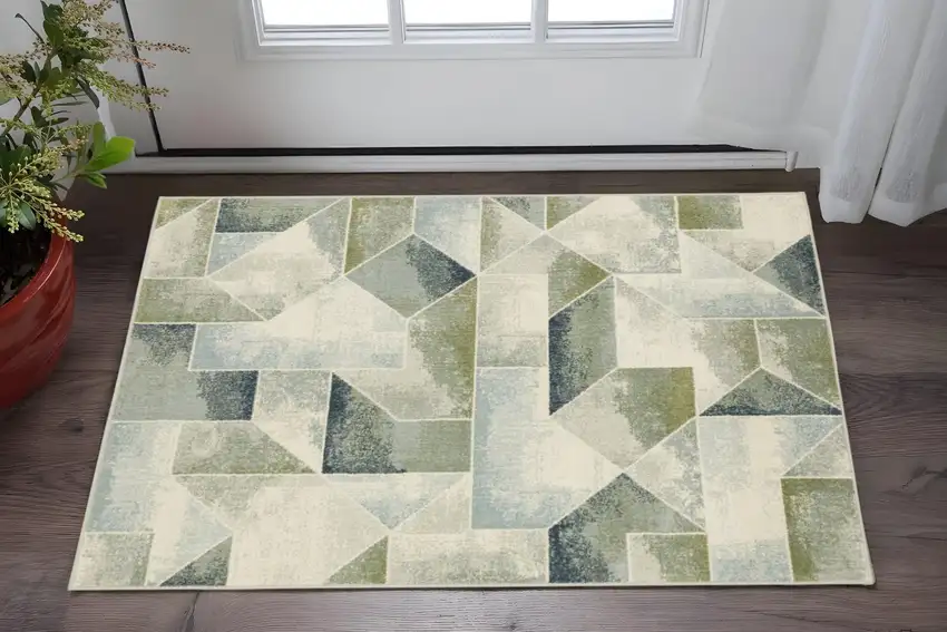 Blue Green Grey Gold And Ivory Geometric Power Loom Stain Resistant Area Rug Photo 1