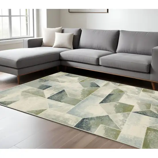Blue Green Grey Gold And Ivory Geometric Power Loom Stain Resistant Area Rug Photo 1