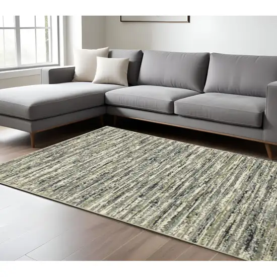 Blue Green Light Blue Grey And Ivory Abstract Power Loom Stain Resistant Area Rug Photo 1