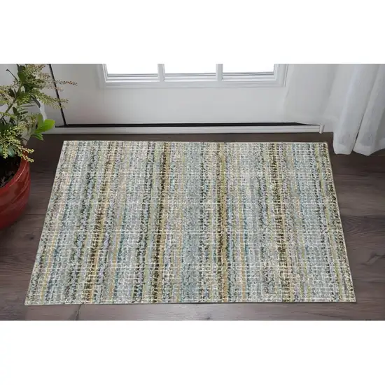 Blue and Ivory Abstract Power Loom Area Rug Photo 1