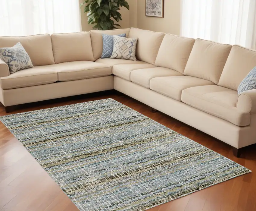 Blue and Ivory Abstract Power Loom Area Rug Photo 1
