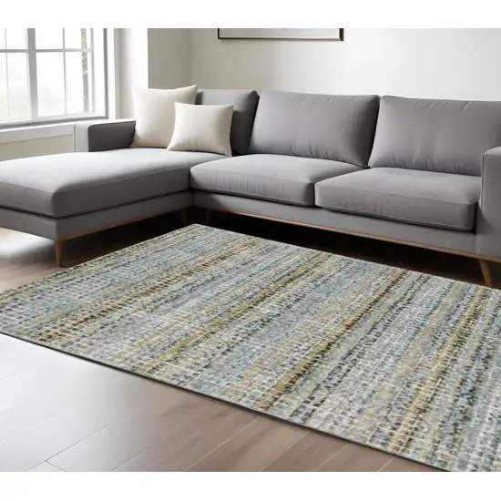 Blue and Ivory Abstract Power Loom Area Rug Photo 1
