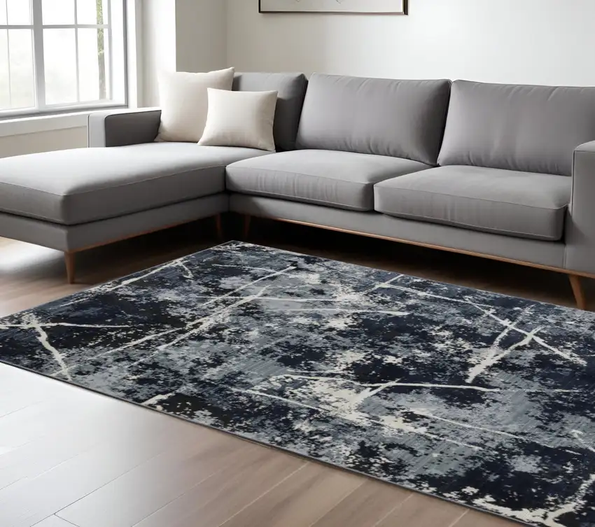 Black and Ivory Abstract Power Loom Area Rug Photo 1