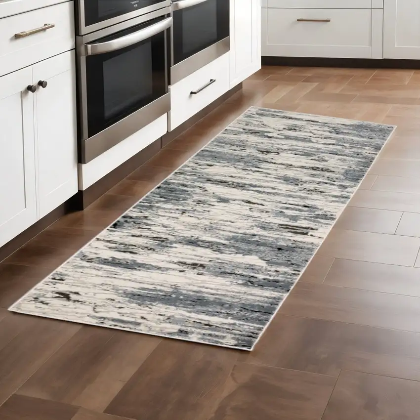 2' X 8' Blue Grey Beige And Brown Abstract Power Loom Stain Resistant Runner Rug Photo 1