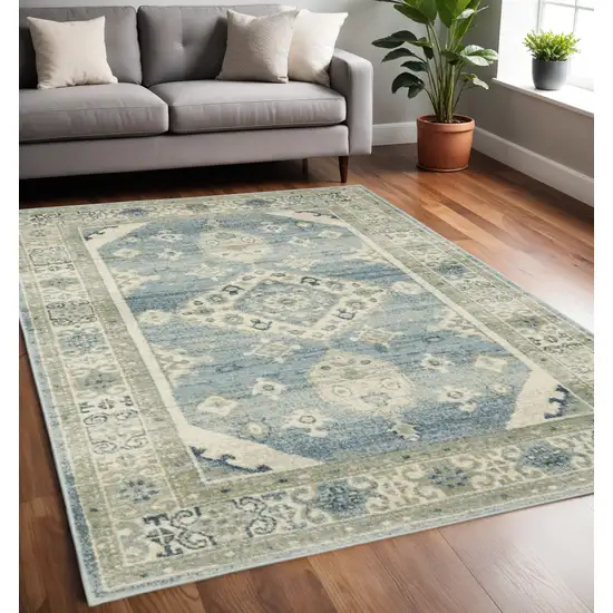 Blue And Beige Oriental Distressed Area Rug Photo 1