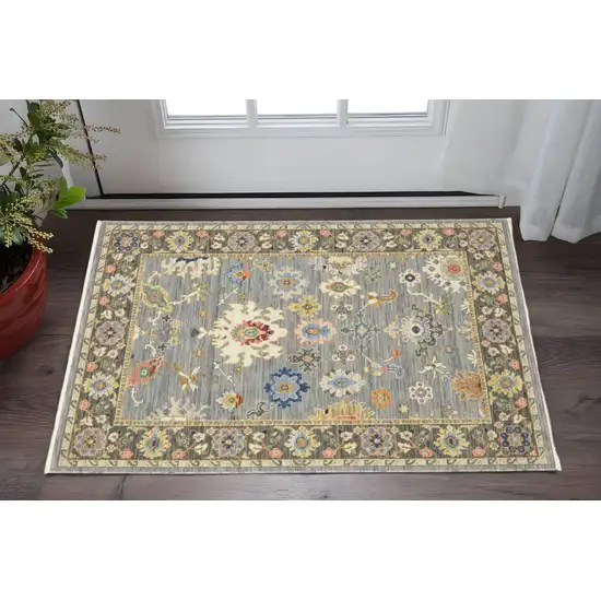 Blue Grey Gold Green Pink Orange Ivory And Red Oriental Power Loom Stain Resistant Area Rug With Fringe Photo 1