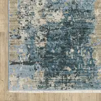 Photo of Blue Grey Ivory Light Blue And Dark Blue Abstract Power Loom Stain Resistant Area Rug With Fringe