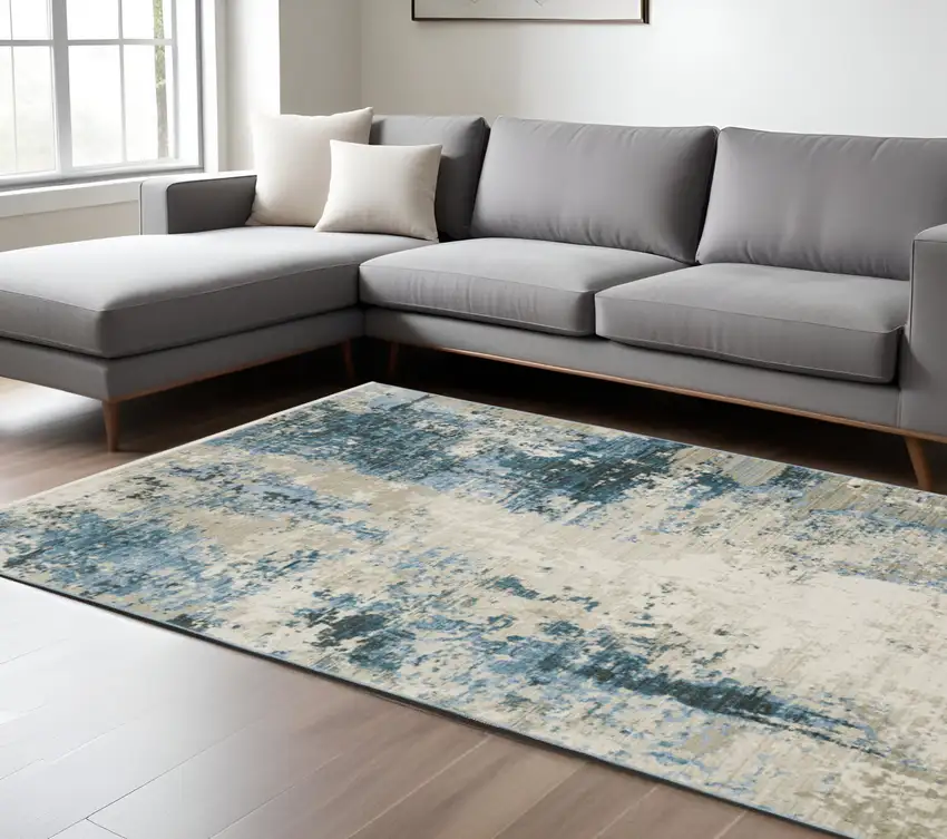 Blue Grey Ivory Light Blue And Dark Blue Abstract Power Loom Stain Resistant Area Rug With Fringe Photo 1