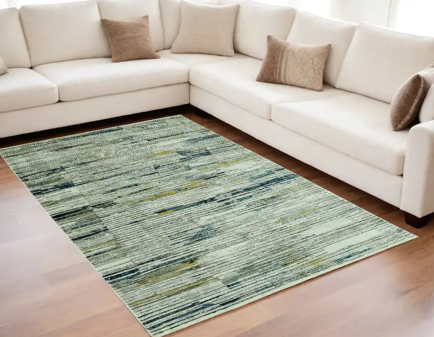 Ivory and Blue Abstract Area Rug Photo 1