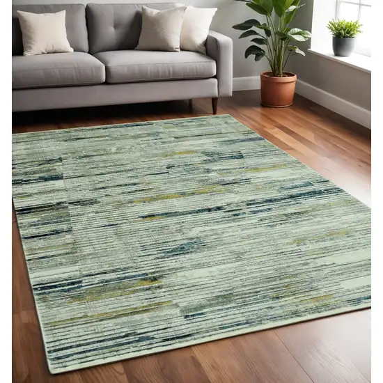 Ivory and Blue Abstract Area Rug Photo 1