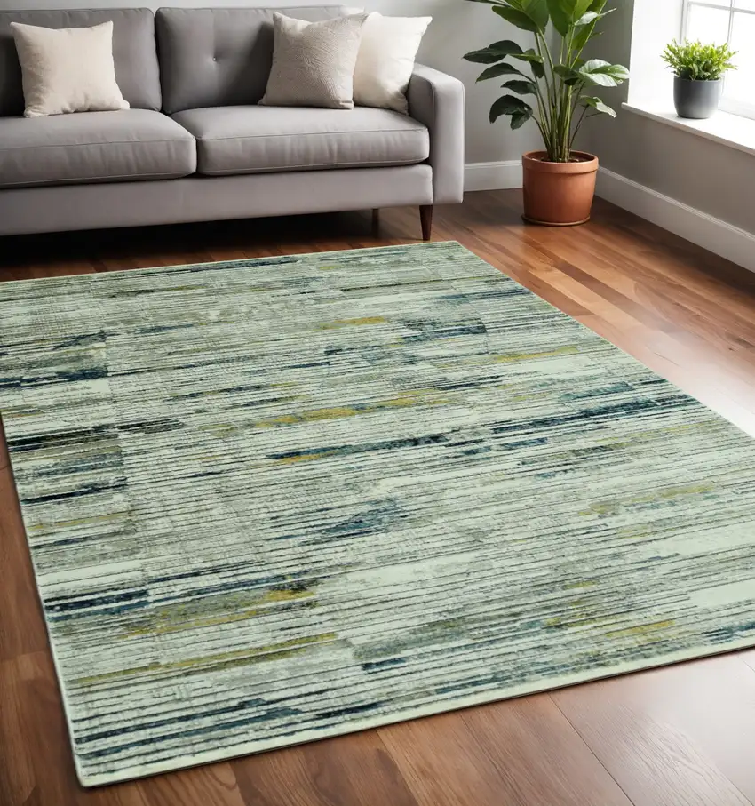 Ivory and Blue Abstract Area Rug Photo 1