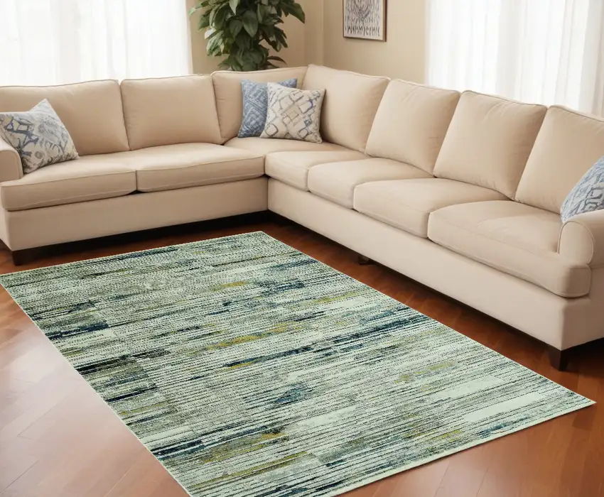 Ivory and Blue Abstract Area Rug Photo 1