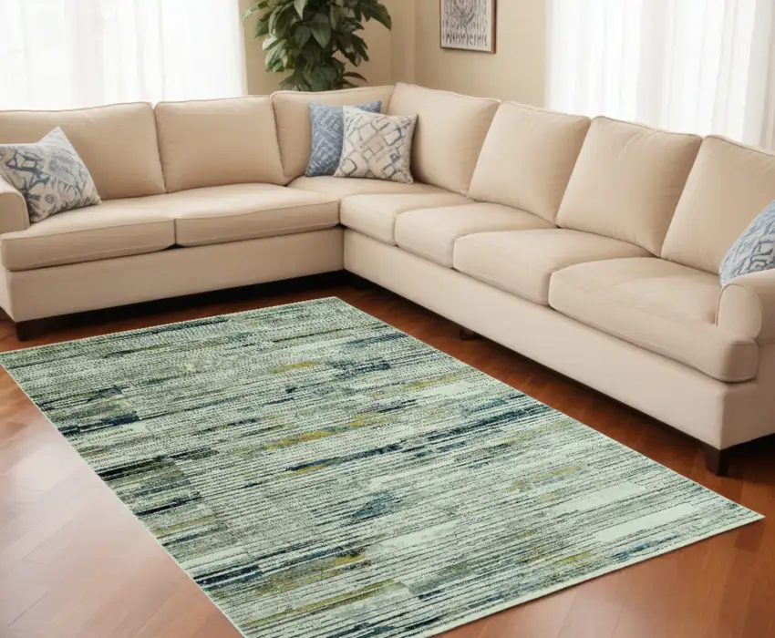 Ivory and Blue Abstract Area Rug Photo 1