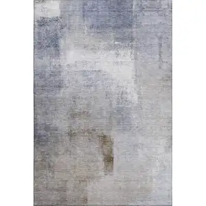 Photo of Blue Ivory And Beige Abstract Washable Area Rug With UV Protection