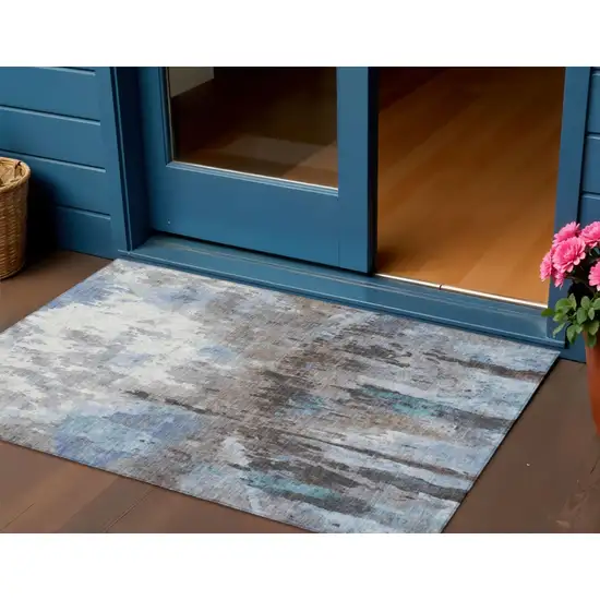 Blue Ivory And Beige Abstract Washable Indoor Outdoor Area Rug Photo 1