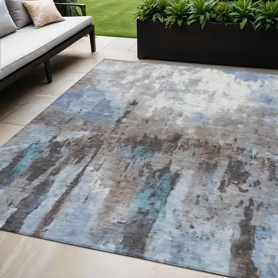 Blue Ivory And Beige Abstract Washable Indoor Outdoor Area Rug Photo 1