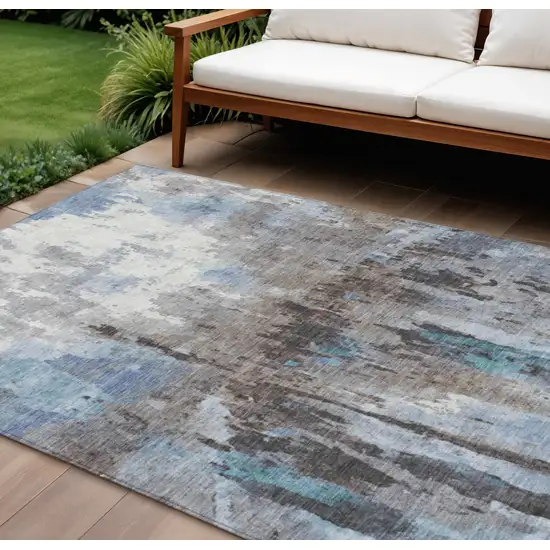 Blue Ivory And Beige Abstract Washable Indoor Outdoor Area Rug Photo 1