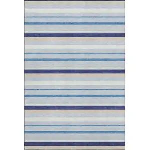 Photo of Blue Ivory And Beige Striped Washable Area Rug With UV Protection