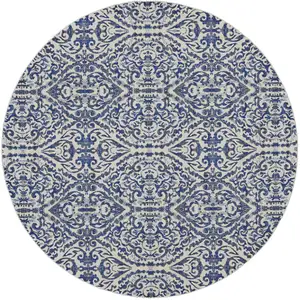 Photo of Blue Ivory And Black Round Floral Distressed Stain Resistant Area Rug