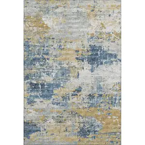 Photo of Blue Ivory And Gold Abstract Washable Area Rug With UV Protection