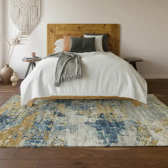 Blue Ivory And Gold Abstract Washable Area Rug With UV Protection Photo 7