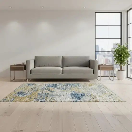 Blue Ivory And Gold Abstract Washable Area Rug With UV Protection Photo 1