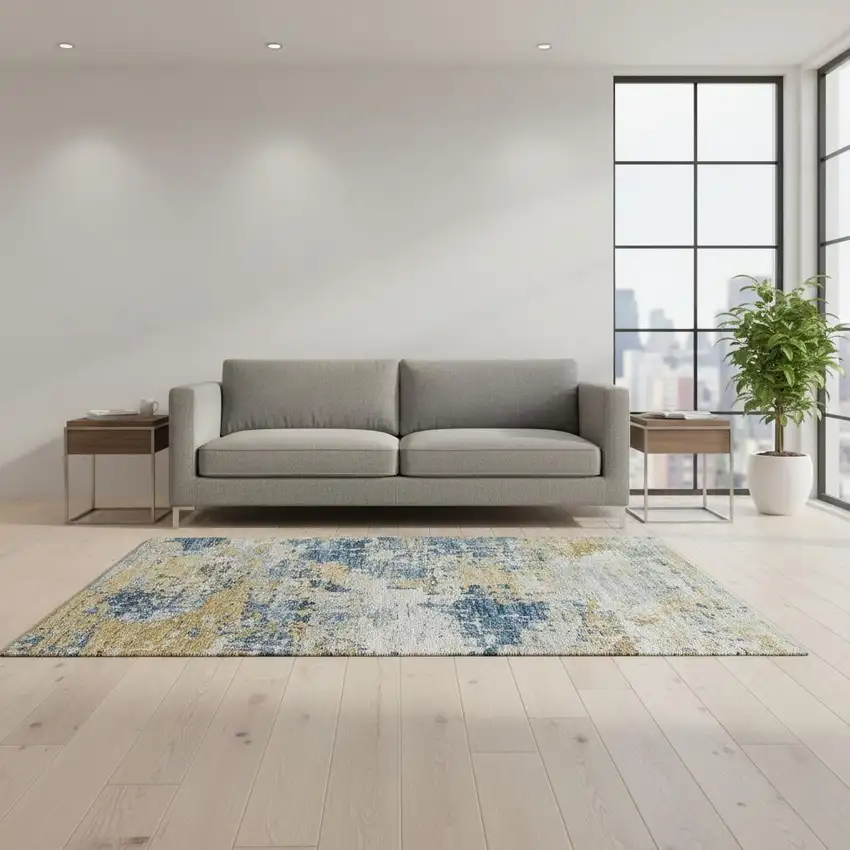 Blue Ivory And Gold Abstract Washable Area Rug With UV Protection Photo 1