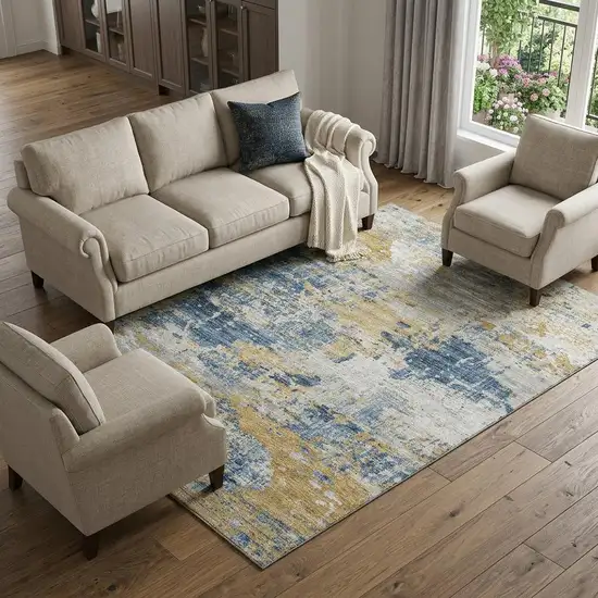 Blue Ivory And Gold Abstract Washable Area Rug With UV Protection Photo 1