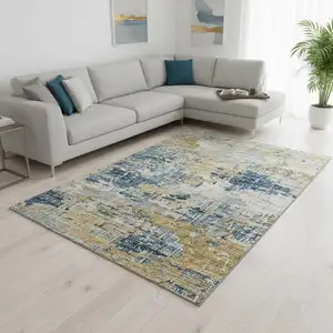 Photo of Blue Ivory And Gold Abstract Washable Area Rug With UV Protection