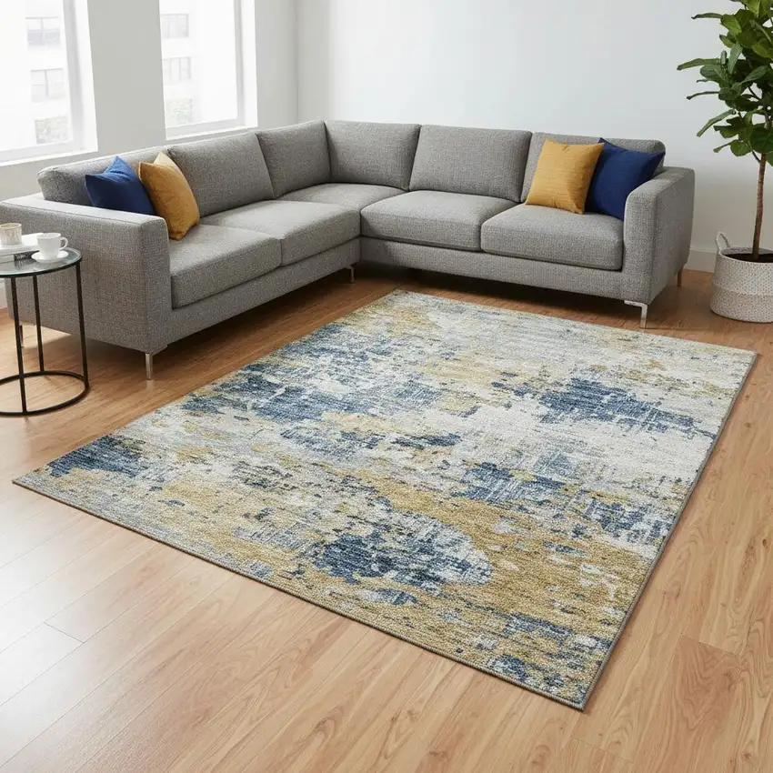 Blue Ivory And Gold Abstract Washable Area Rug With UV Protection Photo 1