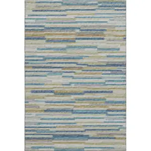 Photo of Blue Ivory And Gold Abstract Washable Area Rug With UV Protection