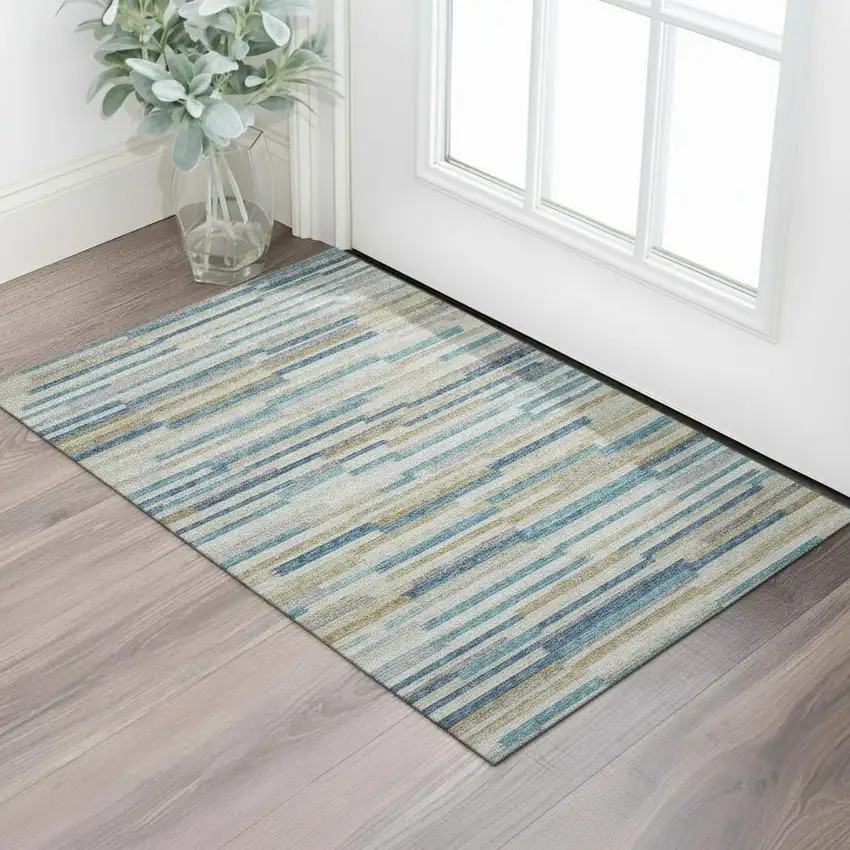 Blue Ivory And Gold Abstract Washable Area Rug With UV Protection Photo 1
