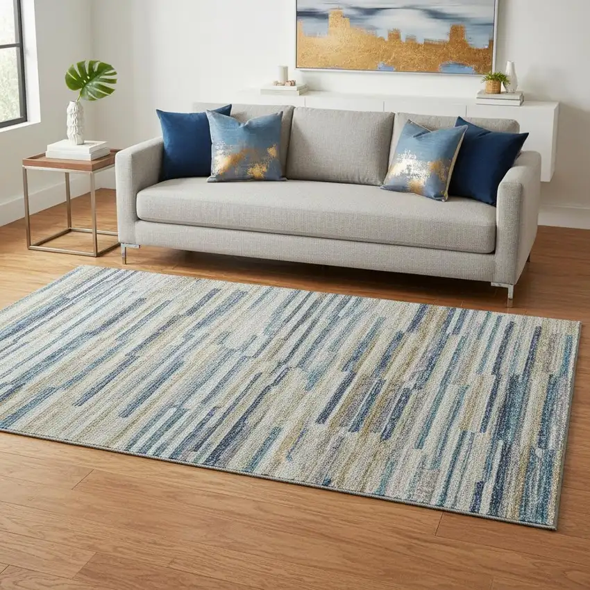 Blue Ivory And Gold Abstract Washable Area Rug With UV Protection Photo 1