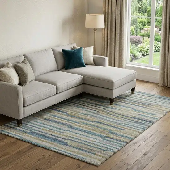 Blue Ivory And Gold Abstract Washable Area Rug With UV Protection Photo 1